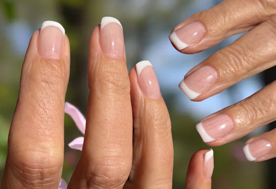 hands with beautiful nails french design